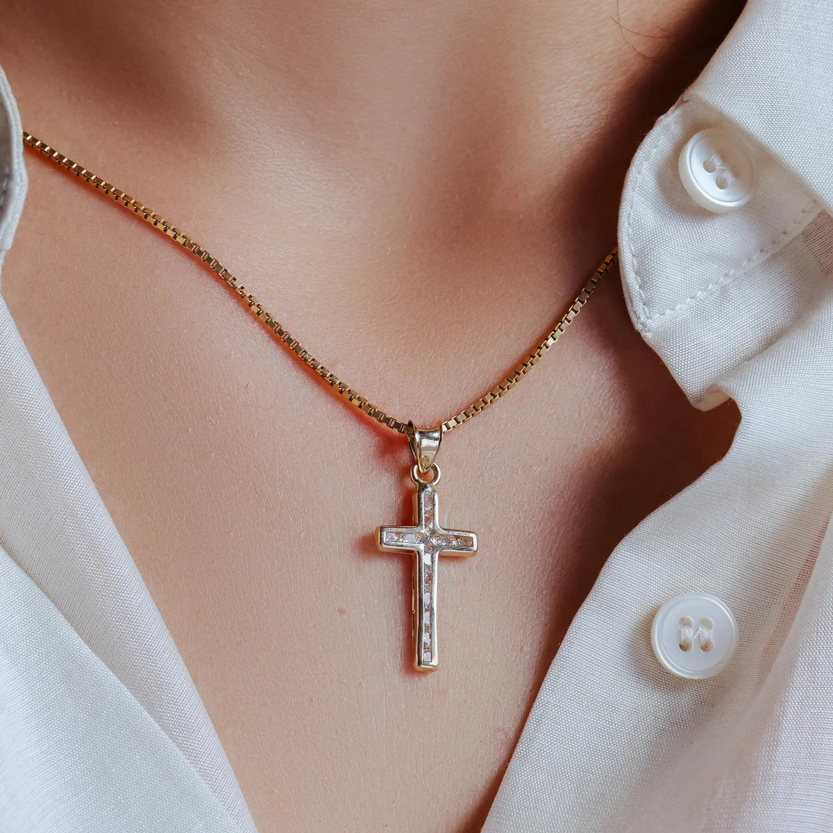 14 Karat Yellow Gold Wavy Cross Clear CZ Pendant