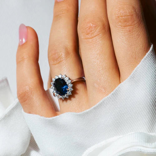 925 Sterling Silver Rhodium Plated Oval Blue and Clear Cluster CZ Flower Ring