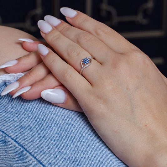 925 Sterling Silver Rhodium Plated Wave Blue Center Flower CZ Ring