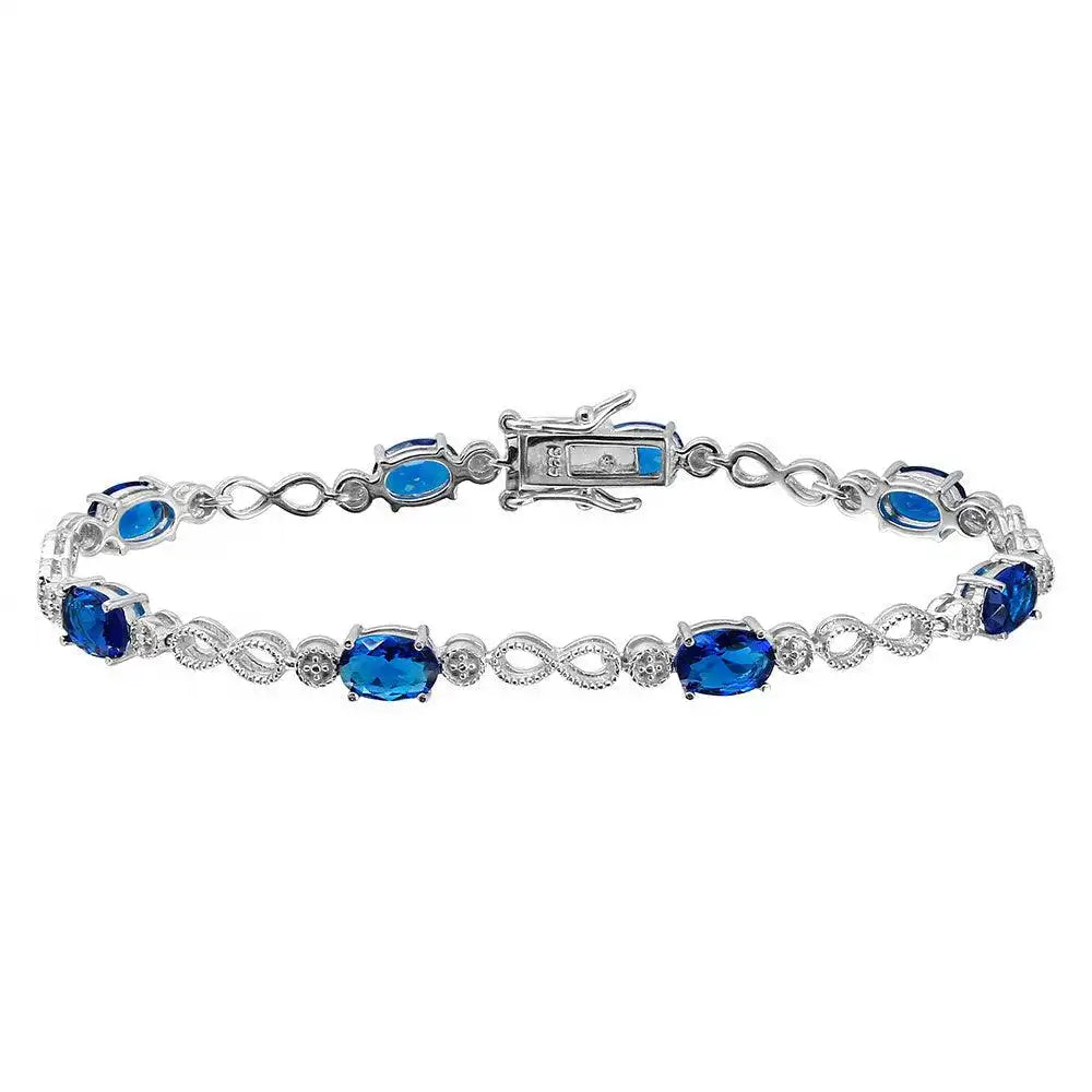925 Sterling Silver Rhodium Plated Infinity Links Blue Oval CZ Bracelet