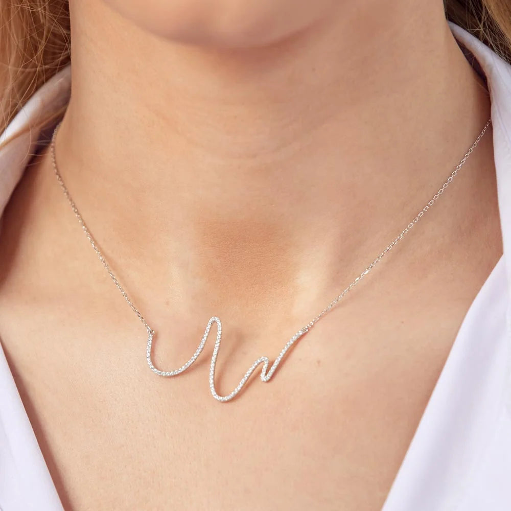 925 Sterling Silver Rhodium Plated Wave Design with CZ Necklace