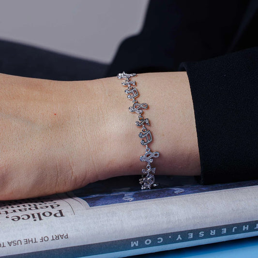 925 Sterling Silver Rhodium Plated 10mm Music Note Tennis CZ Bracelet