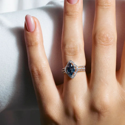 925 Sterling Silver Rhodium Plated 4 Blue Marquise Center CZ Ring