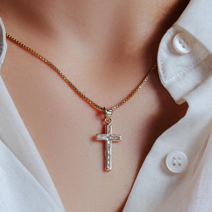 14 Karat Yellow Gold Wavy Cross Clear CZ Pendant
