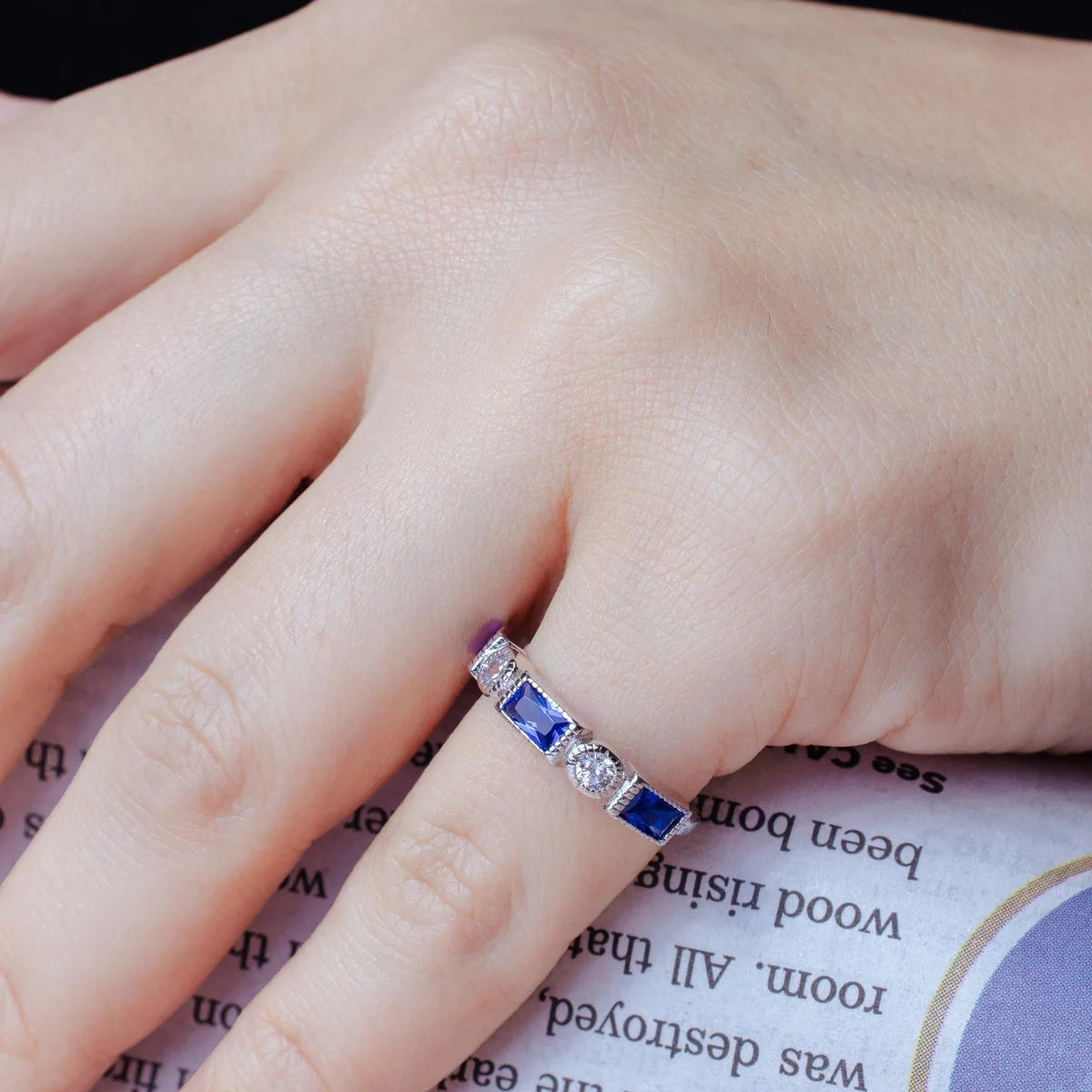 925 Sterling Silver Rhodium Plated Alternating Blue Rectangle and Clear Round CZ Ring