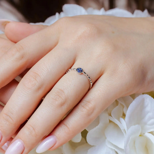 925 Sterling Silver Rhodium Plated Round Shape 4 Blue CZ Ring