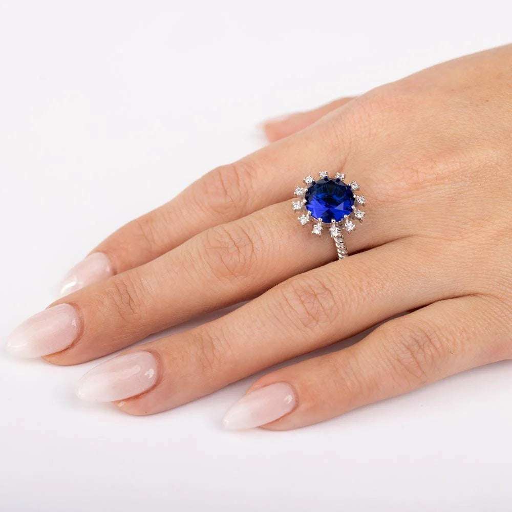 925 Sterling Silver Rhodium Plated Blue Center Flower CZ Ring with Rope Band