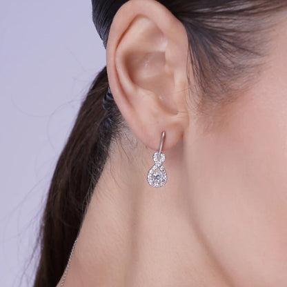 925 Sterling Silver Rhodium Plated Figure 8 Teardrop Clear CZ Dangling Stud Set