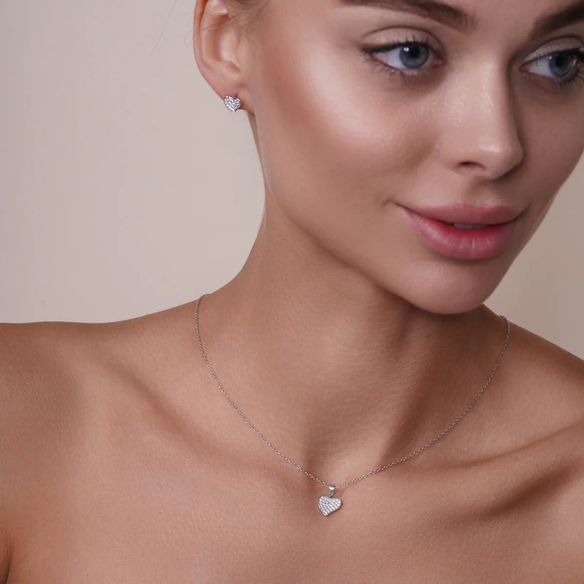 925 Sterling Silver Rhodium Plated Curved Heart Necklace and Earring Set with Clear CZ Stones