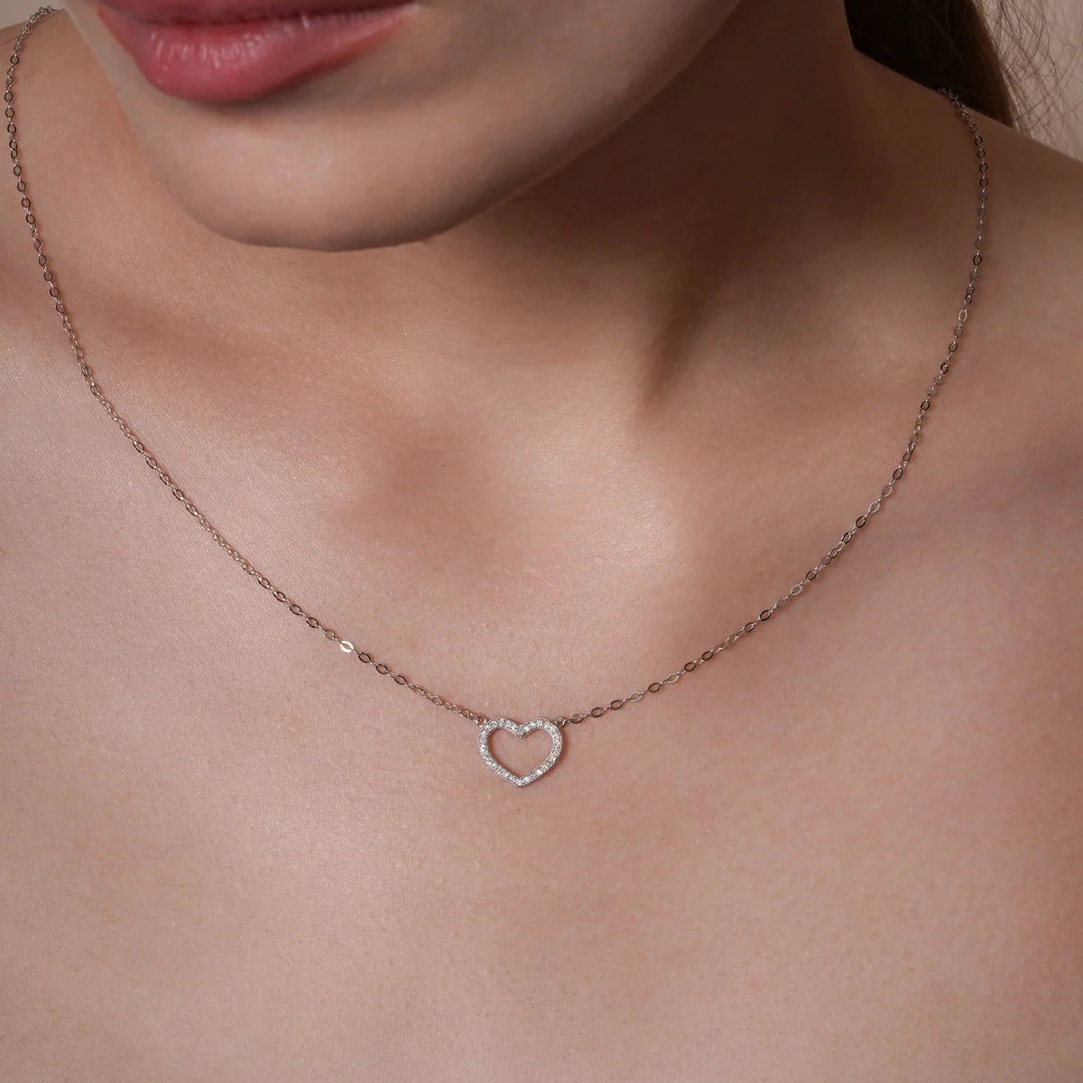 925 Sterling Silver Rhodium Plated Lab Grown Diamond on 13.5mm x 10.5mm Heart Pendant Adjustable Necklace