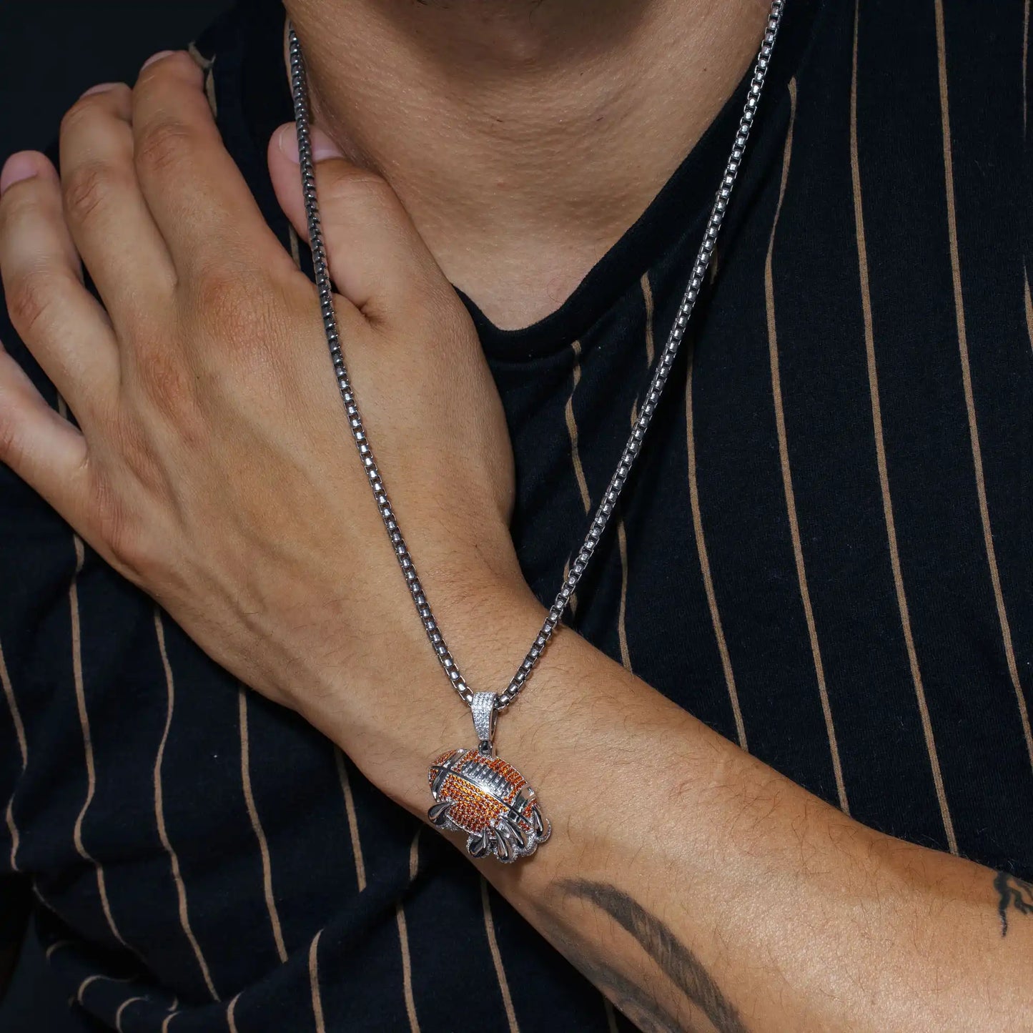 925 Sterling Silver Rhodium Plated Claw Football Clear and Orange CZ Pendant