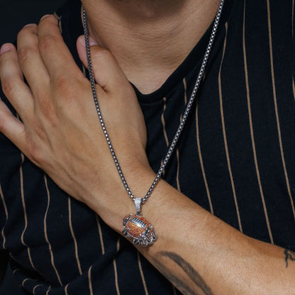925 Sterling Silver Rhodium Plated Claw Football Clear and Orange CZ Pendant