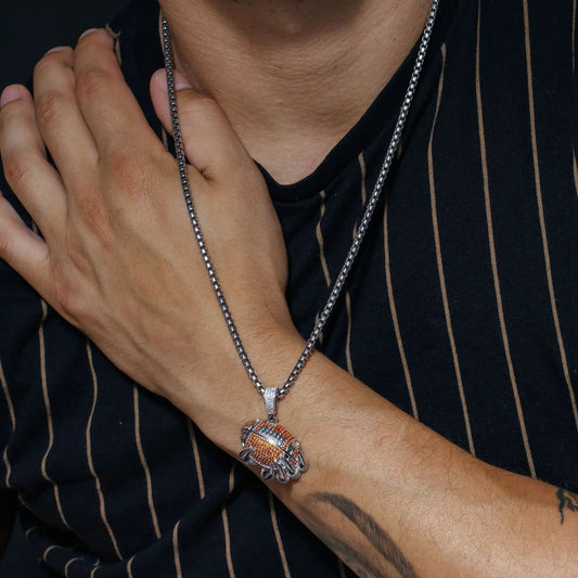 925 Sterling Silver Rhodium Plated Claw Football Clear and Orange CZ Pendant