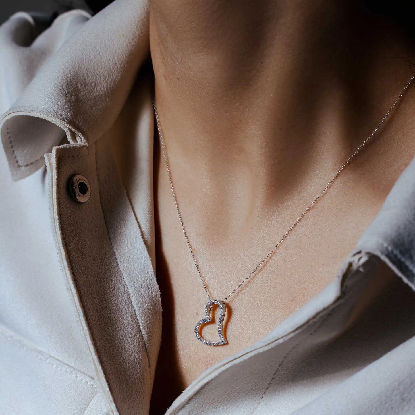 925 Sterling Silver Rhodium Plated Crooked Heart Necklace with CZ