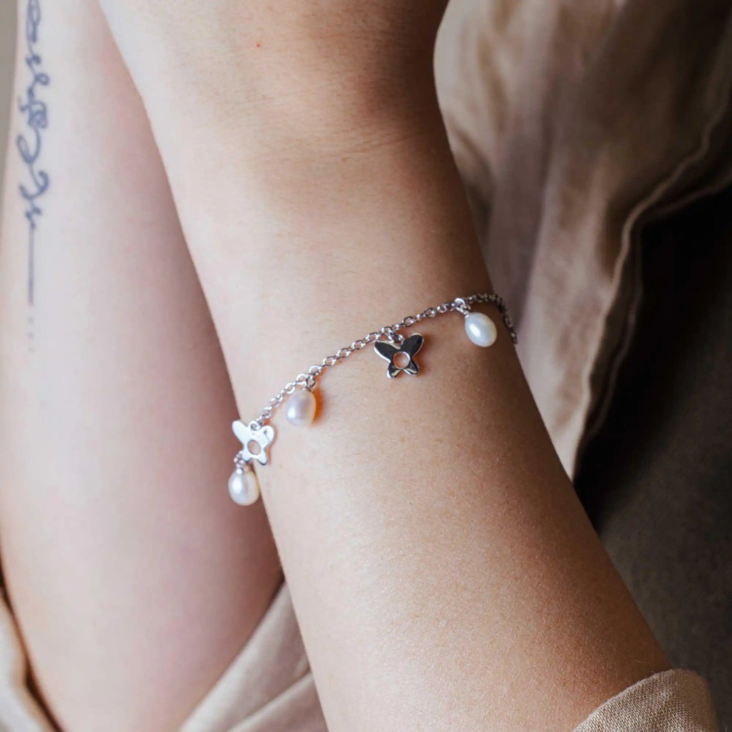 925 Sterling Silver Rhodium Plated Dangling Open Butterfly with Fresh Water Pearl Bracelet