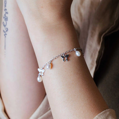 925 Sterling Silver Rhodium Plated Dangling Open Butterfly with Fresh Water Pearl Bracelet
