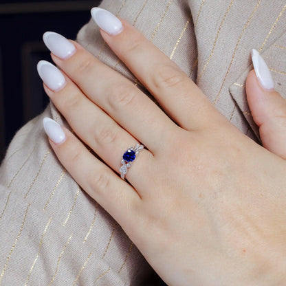 925 Sterling Silver Rhodium Plated Blue Oval CZ Ring